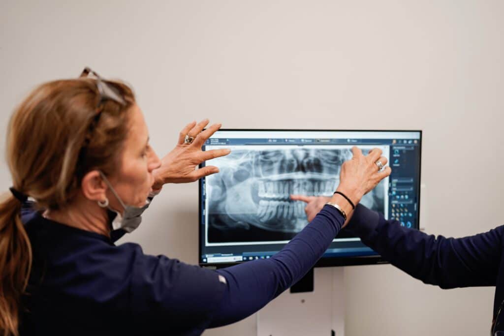 tell your dentist about current medications before getting tooth pulled